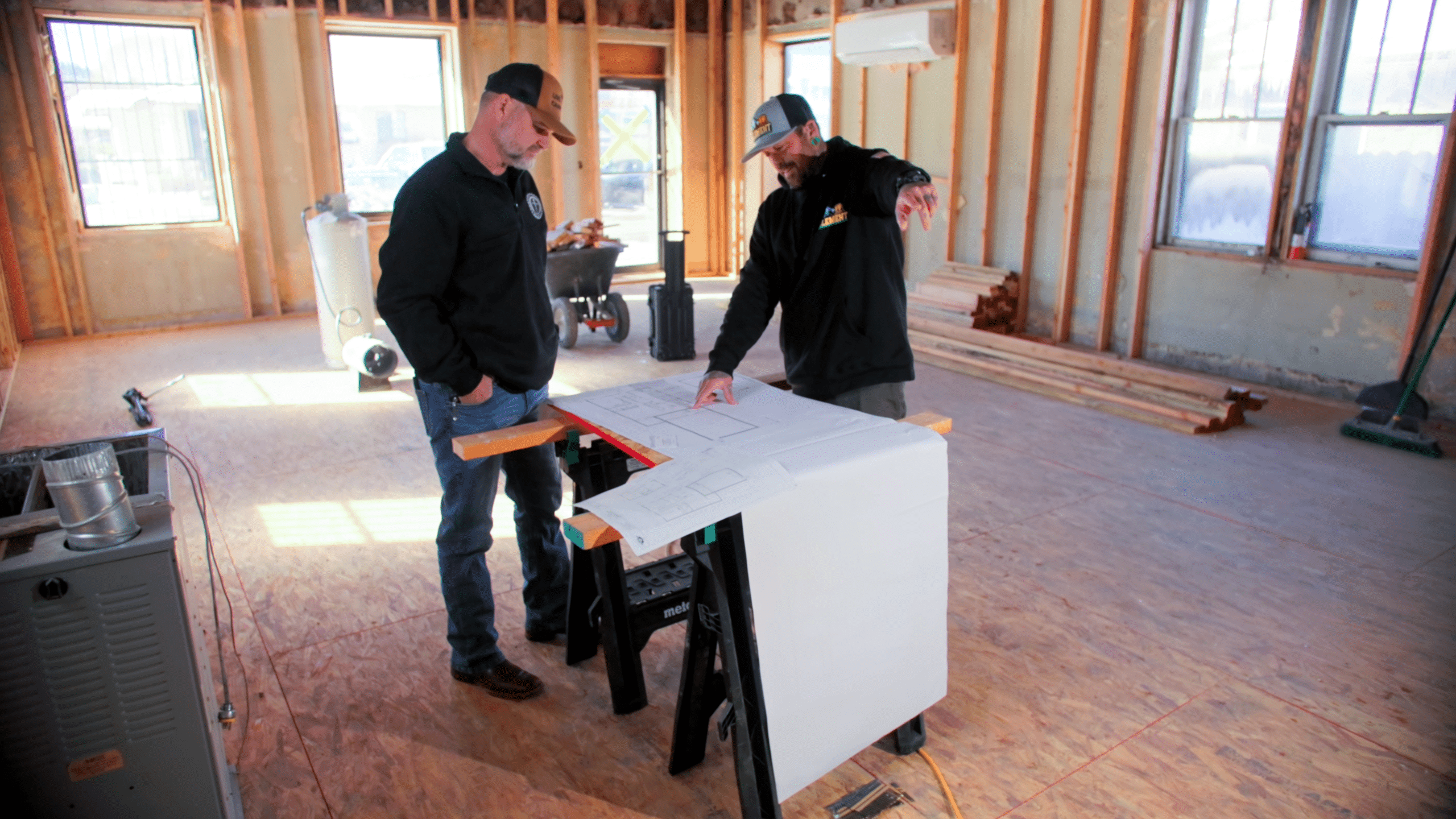 Element Plumbing Heating and Air in Hesperia CA looking at site plans